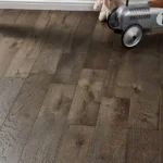 Dark oak wood flooring in a childs playroom