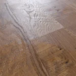 Detailed texture of wire-brushed wood flooring