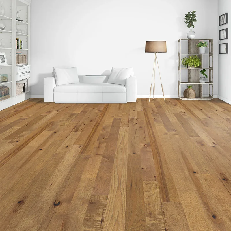 Light honey-toned wood plank flooring in a minimalist white living room.