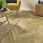Light oak chevron wood flooring in a modern living room