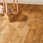 Light oak wood plank flooring in a bright room