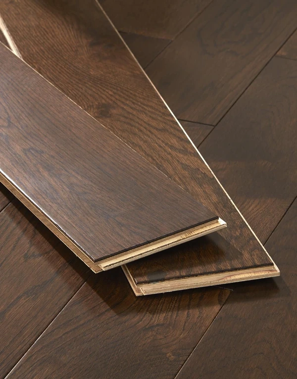 Two tongue-and-groove dark oak flooring sample