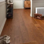 Wide oak wood floor planks with visible grain