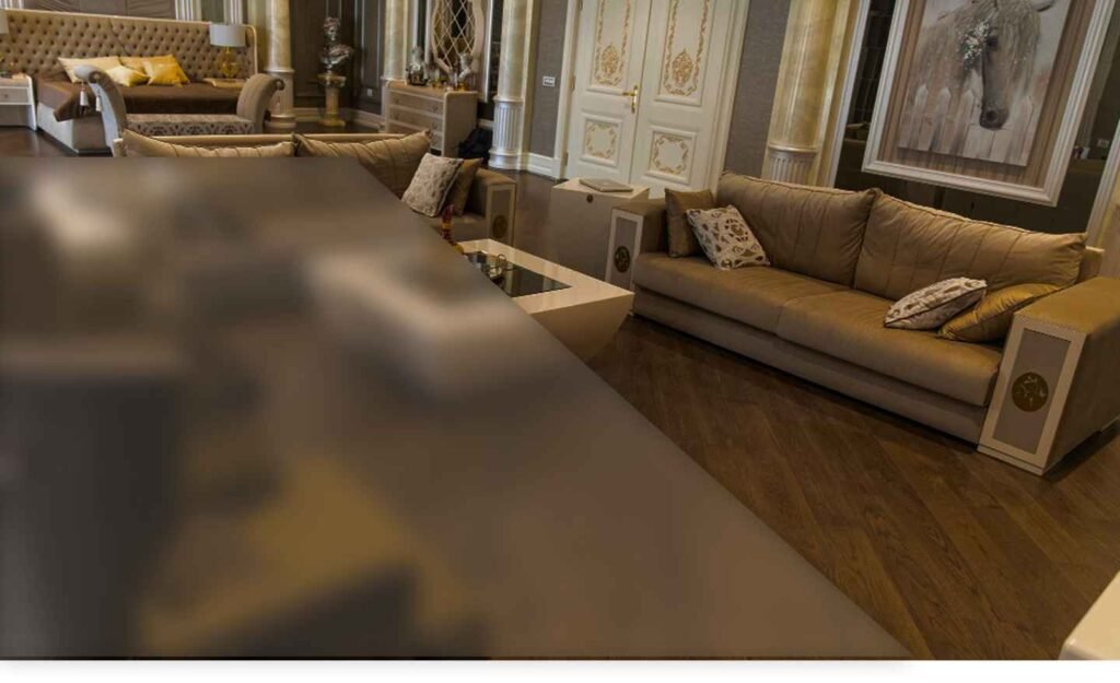 High-end living room design with plush seating and polished walnut wooden flooring for a sophisticated home interior.